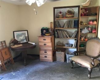 Child's day bed, round oak table (4' or slightly under), dog themes, sidestands (there are two), LPs, old Saints football, Elvis, old Coke bottles, holiday, side chair
