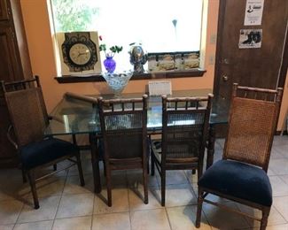 glass top "bamboo" with four matching caned chairs