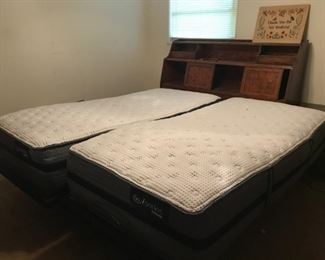 twin mattresses with automated functionality; headboard