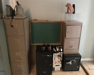 Chalkboard, file cabinets, small safe, men's shoes