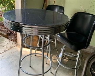 #60 bb misc round black top stainless bar table as is   $65.00