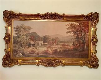 Large gold framed art