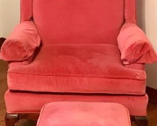 Pink upholstered wing back chair and ottoman
