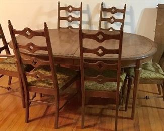 Mid-Century Stanley Furniture oval dining table with leaf and 6 ladder-back chairs