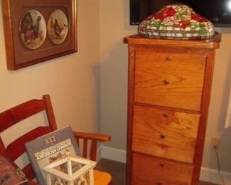 Oak file cabinet, stained glass shade flat screen TV