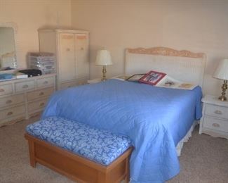 Queen Bed, wicker headboard, armoire, dresser with mirror, chest, 2 nightstands, and oak bed bench