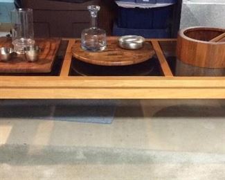Mid century coffee table and teak dansk serving pieces