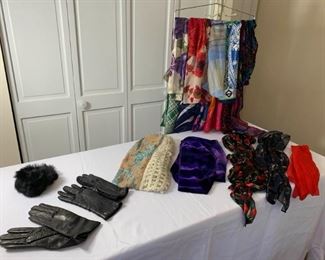 Assorted silk, polyester scarves, leather gloves, and fur ear muffs https://ctbids.com/#!/description/share/237198