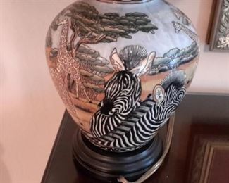 Very pretty ceramic lamp with African animal scene.