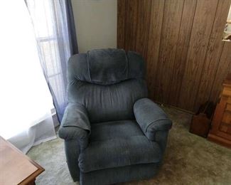 Blue easy chair that reclines. Very comfortable