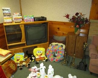 Entertainment center, pillows and household items