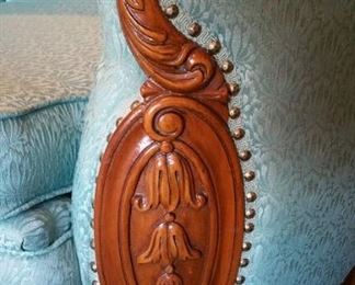 detail of wood trim medallion on chair