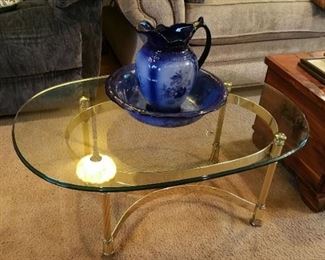 brass and heavy glass small cocktail or side table.  repro flow blue pitcher and bowl