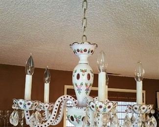Gorgeous chandelier!  Not too big - layered glass - white cutback to cranberry with hand painted florals.  You will have to remove at the end of the sale.  It's worth the wait!