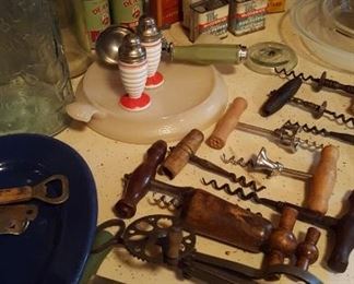 Antique fruit jars and kitchen utensils
