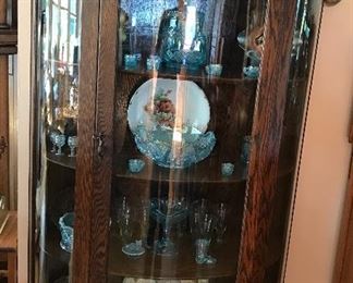 Beautiful bow front china cabinet , lots of beautiful glassware 