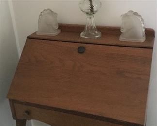 Drop leaf desk , frosted glass horse bookends, old oil lamp