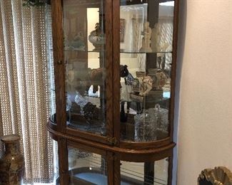 curved glass curio cabinet and lots of great things to fill it with at this one :))