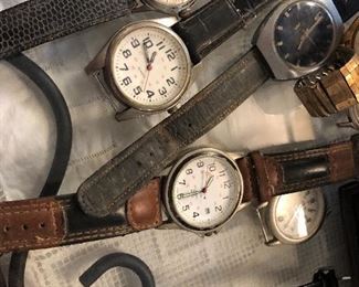lots of old watches -in varying states of need