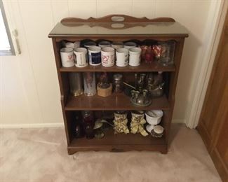 Small bookcase with cups & decor items