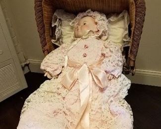 Vintage 20" soft baby doll with porcelain head.  Blue eyes, no hair, good condition.