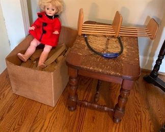103- Children's wood blocks, vintage baby doll, wicker stool