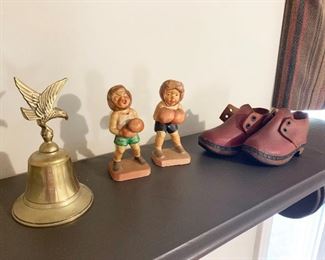 95-Brass eagle bell, vintage little boys boxing figurines, vintage red leather baby shoes, wood shelf measures 48" l x 10"deep