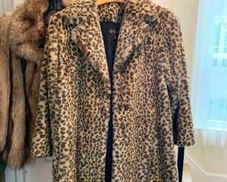 57- Women's waist-length leopard print fuzzy button down winter coat