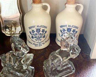 43- Pair of Henry McKenna Sour Mash Bourbon Whiskey ceramic jugs, vintage bucking horse glass bookends