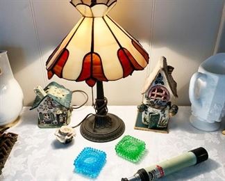 32- Stained glass accent table fence, ceramic cottages, depression glass candle holders, vintage telescope, milk glass pitcher