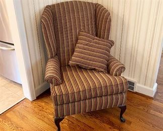 23- Set of two cloth upholstered easy chairs with wooden feet in excellent condition