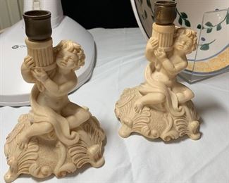 19- Pair of lovely ivory colored cherub candle holders