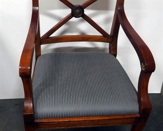 Arm Chair With Crossed Back And Metal Emblem, Padded Seats, Carved Gold-Tone Floral Designs In Arm Rests, 35"H