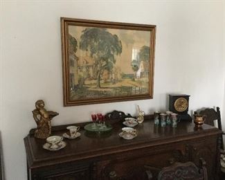Antique buffet. Vintage wall art.