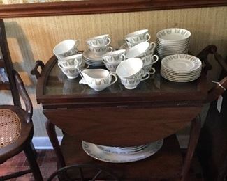 Wood tea cart with removable glass tray.