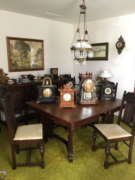 Antique dining table with 6 chairs. Sample selection of the 100+ beautiful clocks.