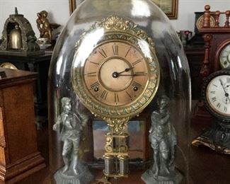 Beautiful domed antique crystal palace clock with cast metal figural soldiers