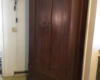 Antique craftsman oak wardrobe cabinet