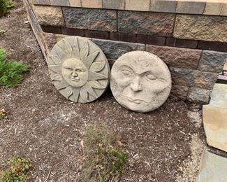 Cement garden faces.