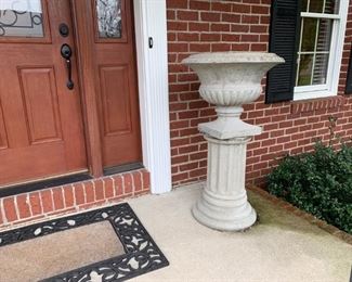 One of two matching urns for sale.