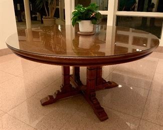 A stained oak Viking table by Romweber. Glass cut for top. Excellent condition.