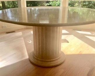 Majestic Doric Travertine Column serves as base to this gorgeous table!