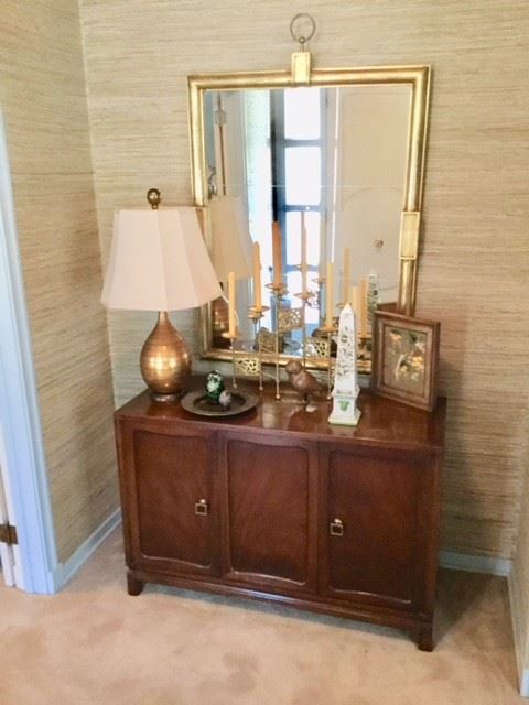 THE SIDE CABINET WITH TWO DOORS, AND BEHIND THE LEFT DOOR IS THREE DRAWERS, STORAGE BEHIND OTHER DOOR AND THE MIDDLE  PANEL----GREAT CONDITION   THE MIRROR IS SO GREAT AS IS THE LAMP