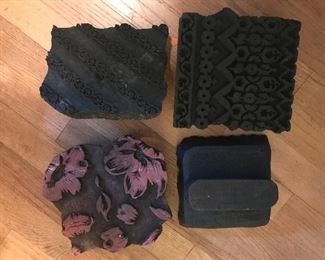 Several of many antique wood carved wallpaper block stamps