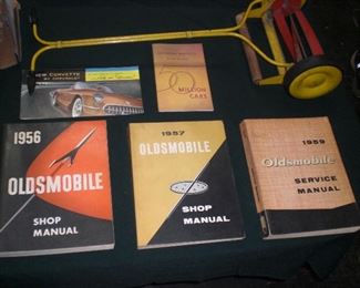 1958 Corvette color brochure, 1950's Oldsmobile service manuals, childs' reel type working lawn mower