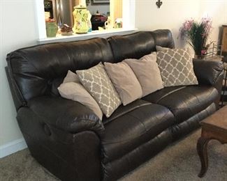 Motorized recliners on each side of sofa (pleather)