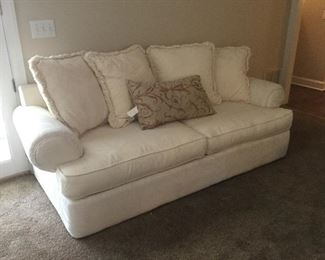 Ivory sofa with 4 pillows 