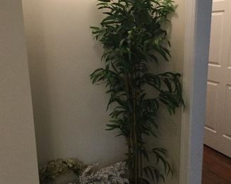 Artificial bamboo tree and several wreaths in dining room, more wreaths in garage !