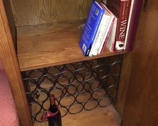 Lower part of Howard Miller wine and spirits cabinet with wine rack
