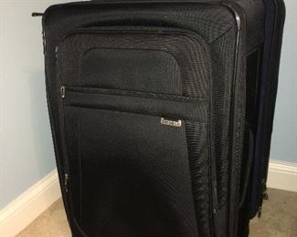 Several sets of nice luggage.  